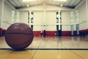 A basketball sitting on the court