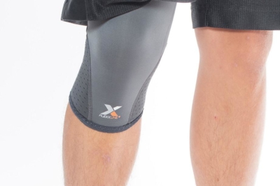 Person wearing Flexxline Knee Sleeve